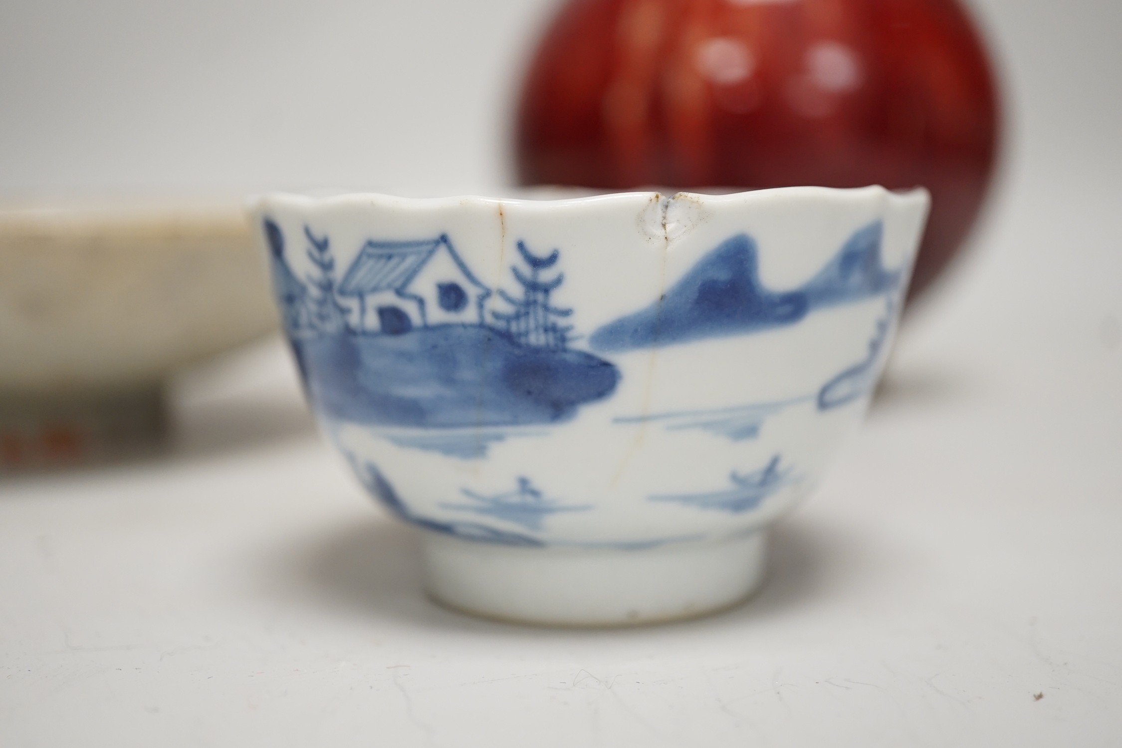 A Chinese sang de boeuf glazed bottle neck vase, together with a Chinese blue and white tea bowl, and a Chinese dish, tallest 23cm